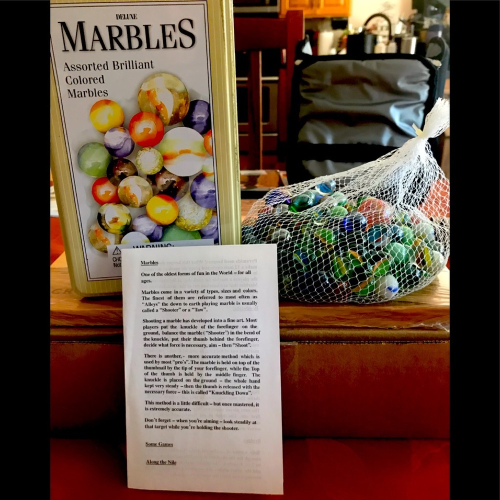 EUC Never played Deluxe Marbles Game Set in a Tin Box. from Target circa 2003.